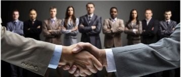 Five corporate hands joined together symbolizing unity and teamwork at QVC Exports ferroalloy manufacturing company
